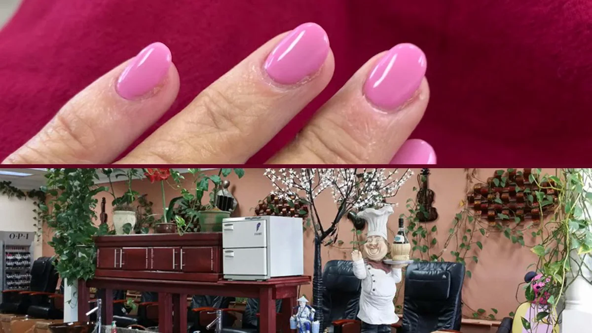 Pink and white acrylic nails on display.